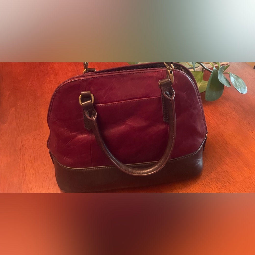 All leather Tignanello Handbag in Merlot.  Rarely used and in excellent shape.